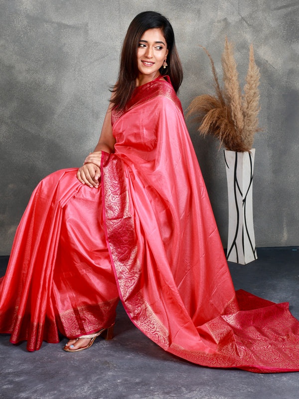 A Pink Saree adorned with a beautiful border - Thugil