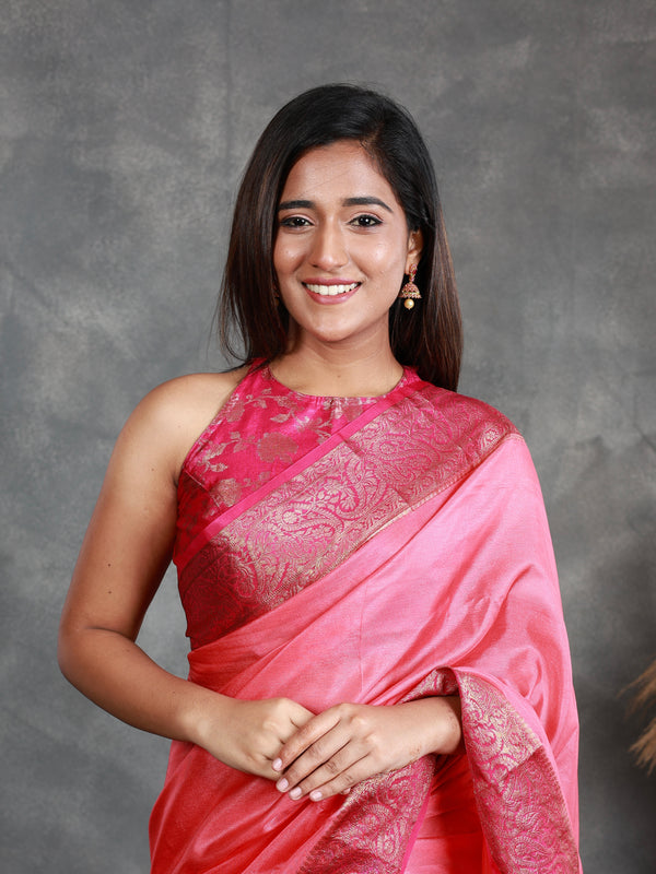 A Pink Saree adorned with a beautiful border - Thugil