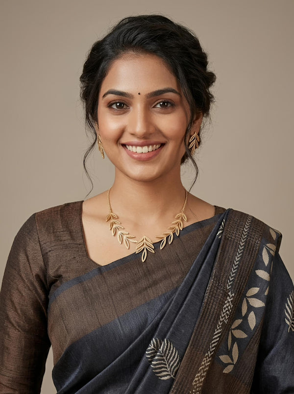 Anbaazhi -Pure Tussar Silk Saree with Zari Border & Traditional Print