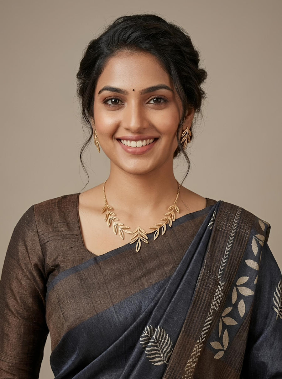 Anbaazhi -Pure Tussar Silk Saree with Zari Border & Traditional Print