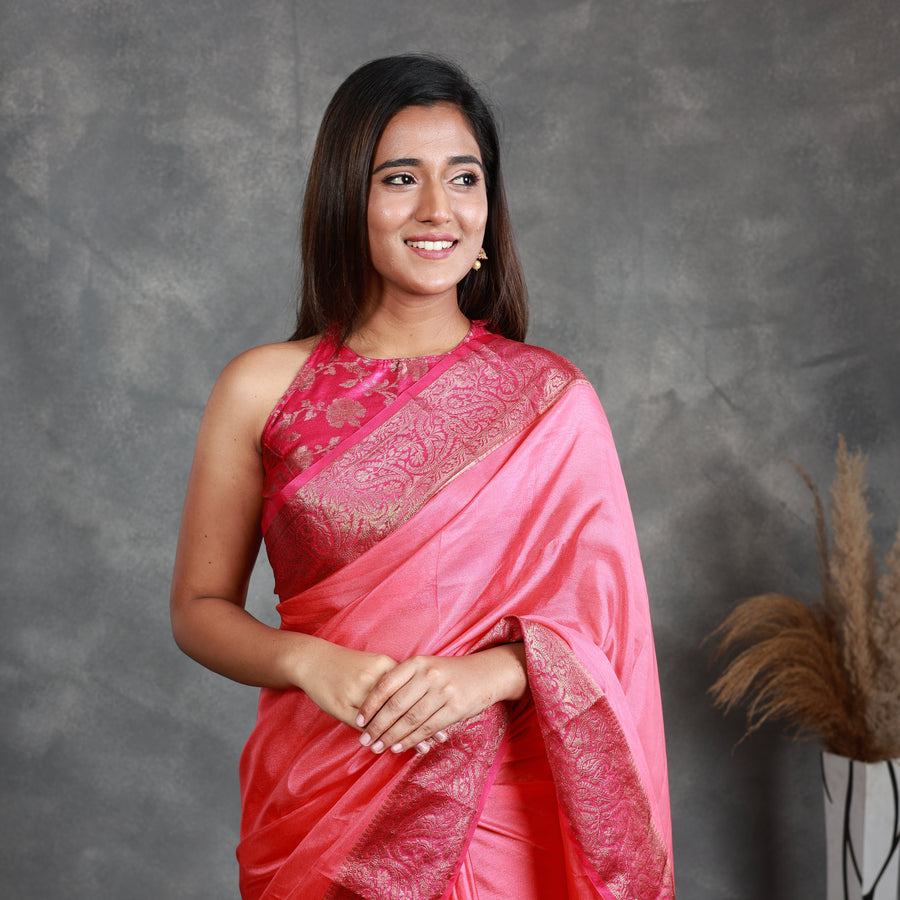 A Pink Saree adorned with a beautiful border - Thugil