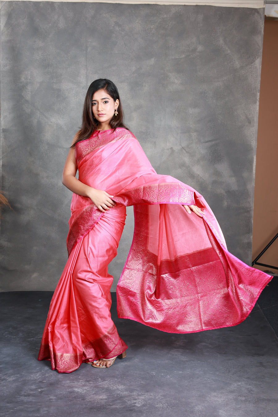 A Pink Saree adorned with a beautiful border - Thugil