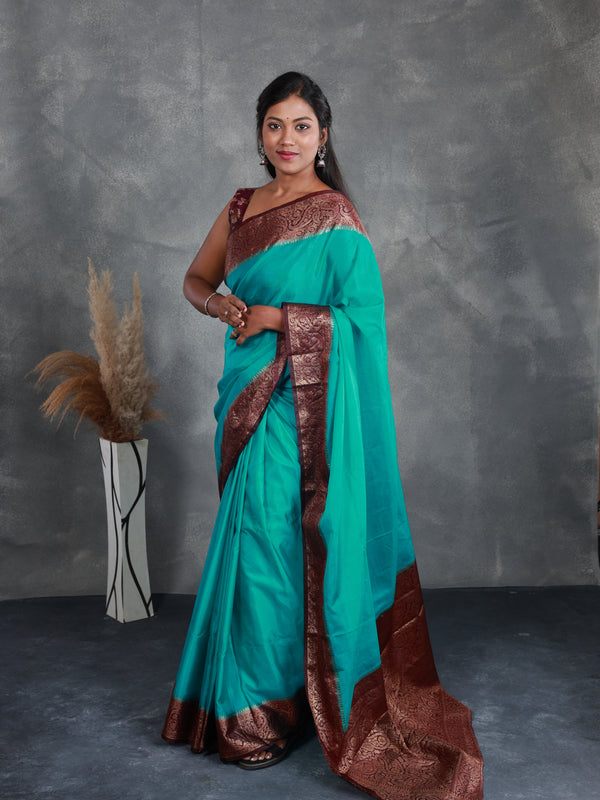 Teal Saree with Contrast Border - Thugil
