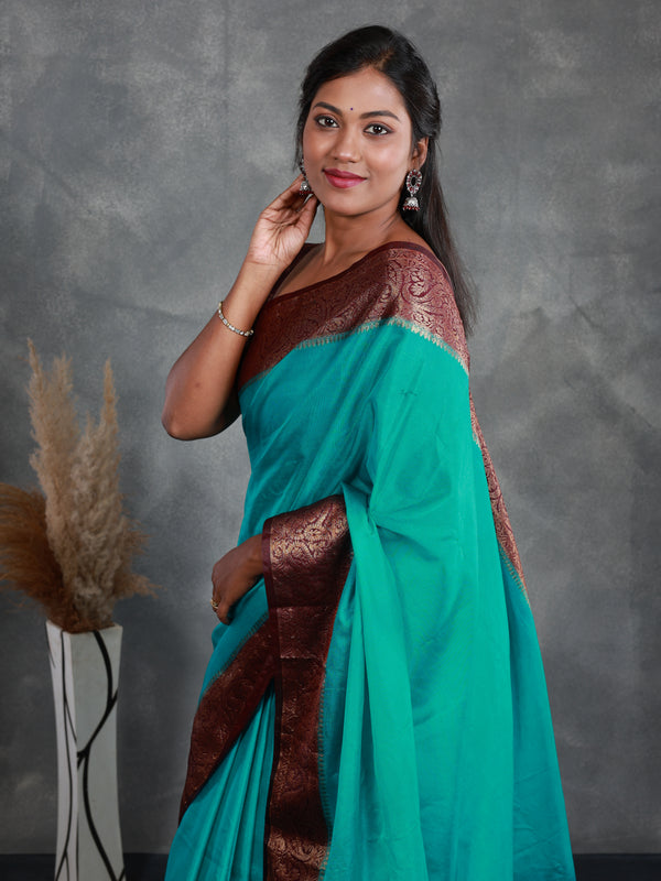Teal Saree with Contrast Border - Thugil