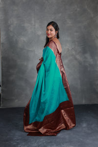 Teal Saree with Contrast Border - Thugil